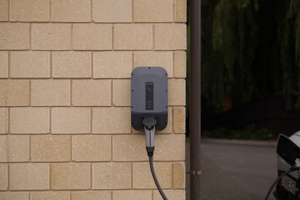 Wall-mounted electric vehicle charging point